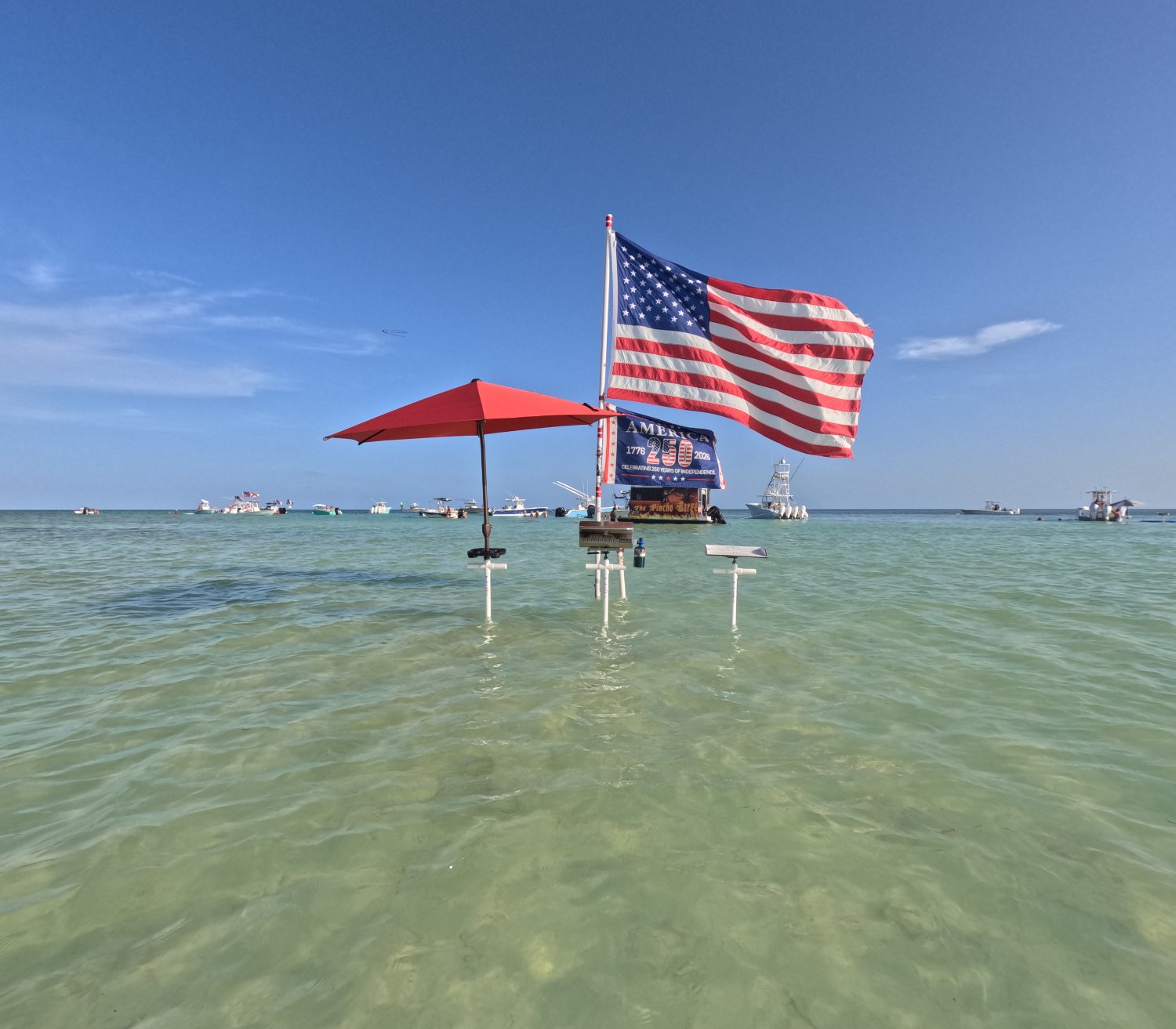 PIPE IT sandbar base with umbrella, flag, grill and cutting table