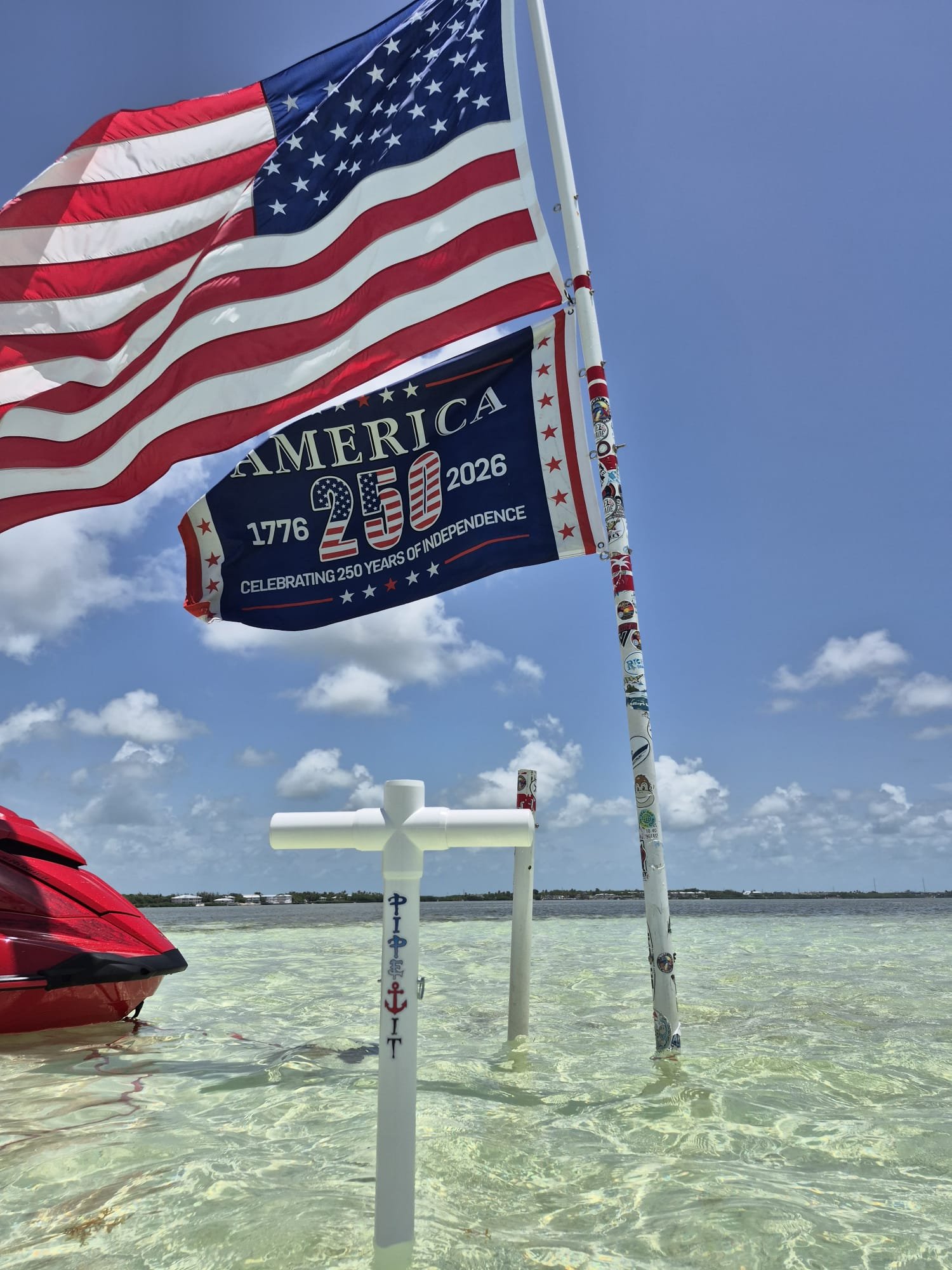 American flag flying from a PIPE IT flag pole